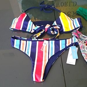 2 Bikini bottoms and Cupshe tie front bikini with matching bottom.